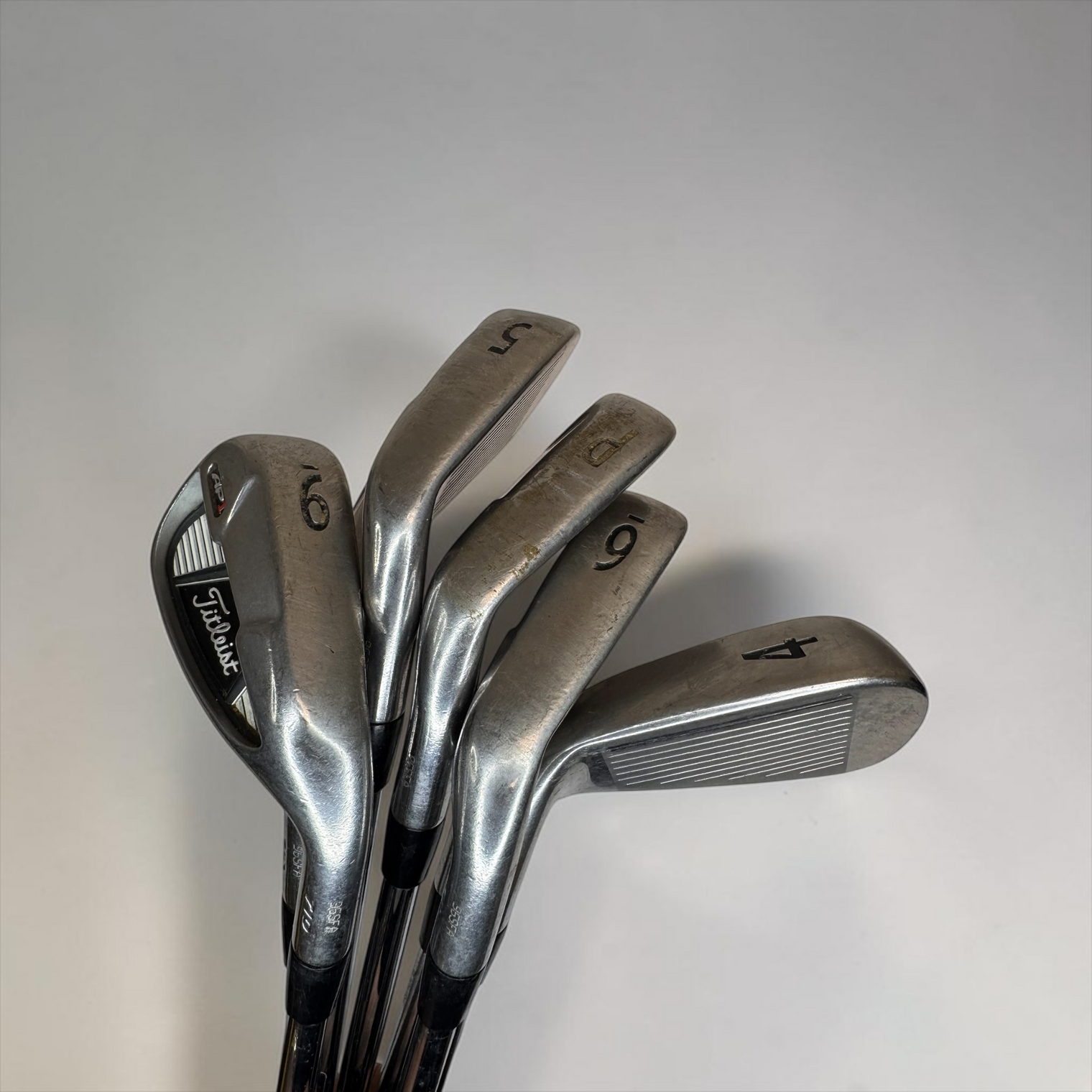 Pre-Owned Titleist Ap1 710 Iron Set 4-PW with NS Pro 105 R Shafts